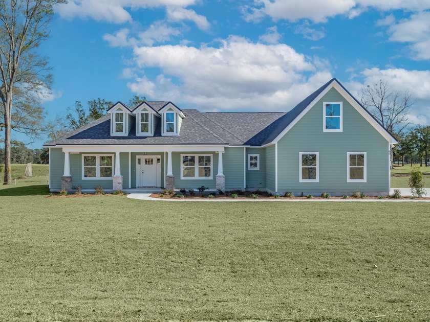 Move-in Ready! Exquisite new construction overlooking hole 6 of - Beach Home for sale in Crawfordville, Florida on Beachhouse.com
