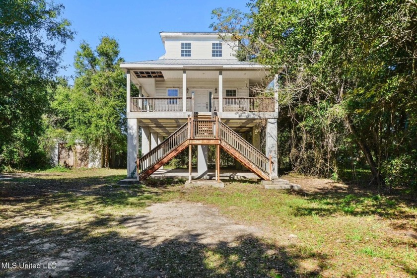 Experience coastal living at its finest in this 2-bedroom - Beach Home for sale in Pass Christian, Mississippi on Beachhouse.com