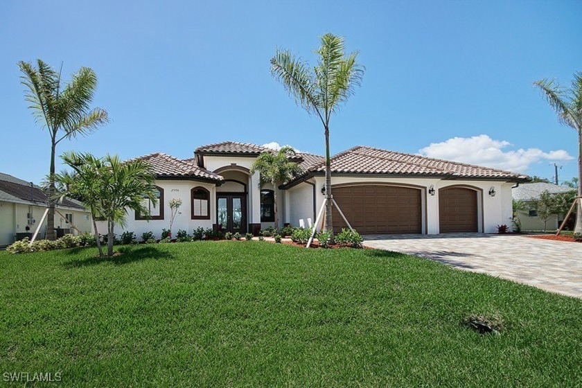 Experience luxurious waterfront living in this exquisite direct - Beach Home for sale in Cape Coral, Florida on Beachhouse.com