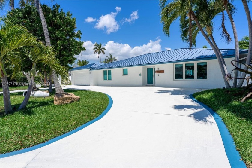 Stunning waterfront 4 bedroom home with 55 feet on the - Beach Home for sale in Fort Lauderdale, Florida on Beachhouse.com