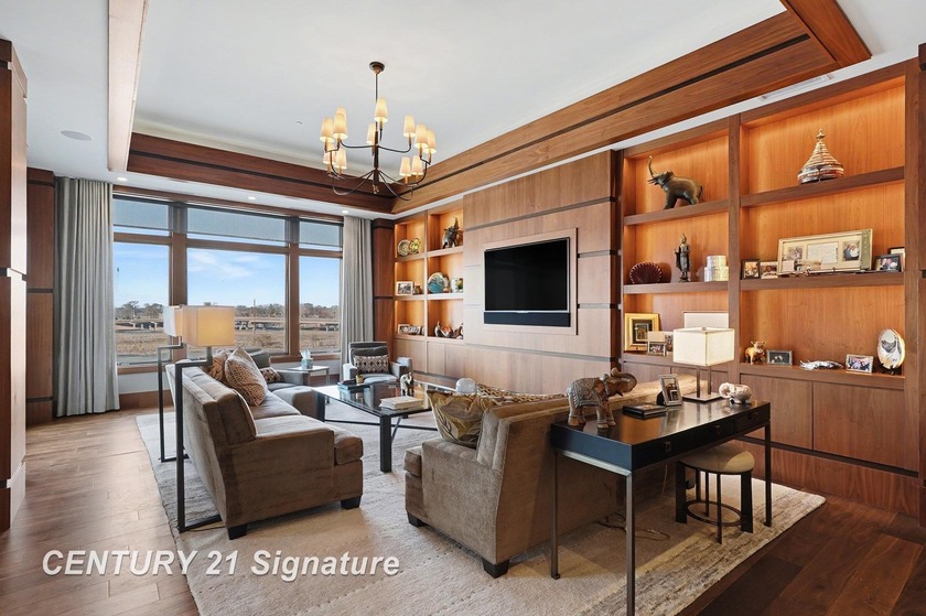 Experience elevated waterfront living in this exceptional - Beach Condo for sale in Bay City, Michigan on Beachhouse.com