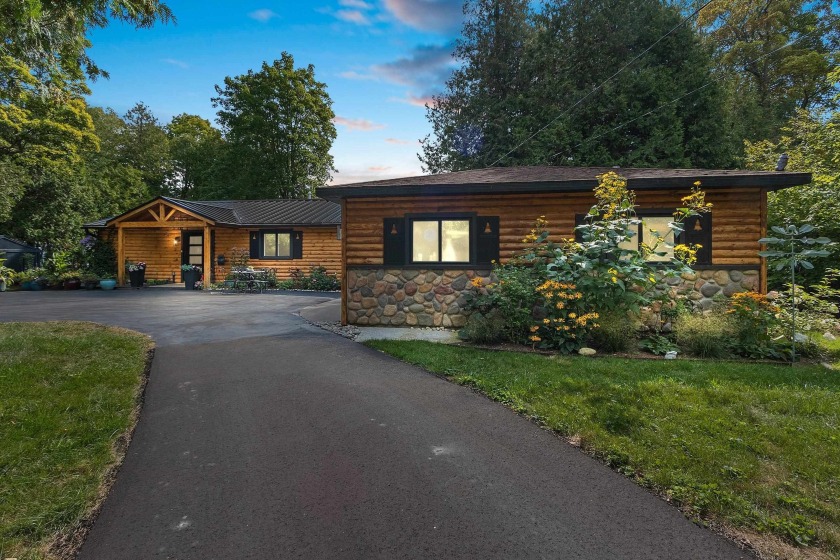 Welcome to the Unsalted Coast Cottage Anchored on the sandy - Beach Home for sale in Algoma, Wisconsin on Beachhouse.com