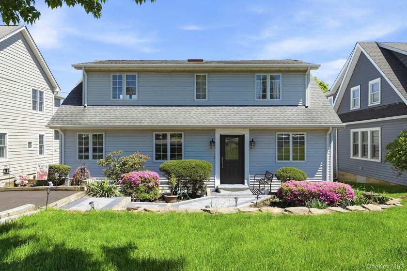 From the moment you arrive, the home's timeless Colonial design - Beach Home for sale in Northport, New York on Beachhouse.com