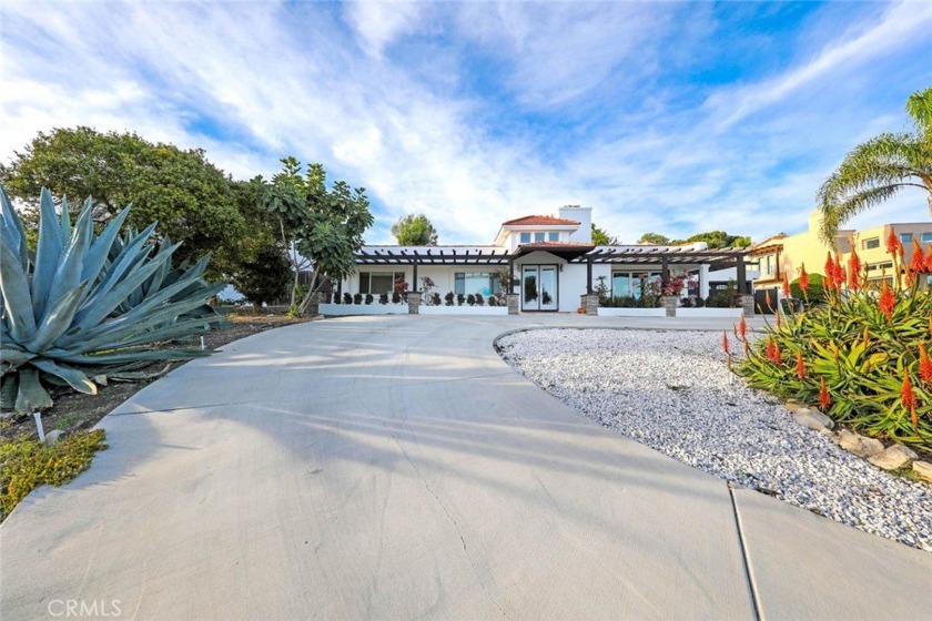 Welcome to this exquisite single-level home perched high above - Beach Home for sale in Rancho Palos Verdes, California on Beachhouse.com