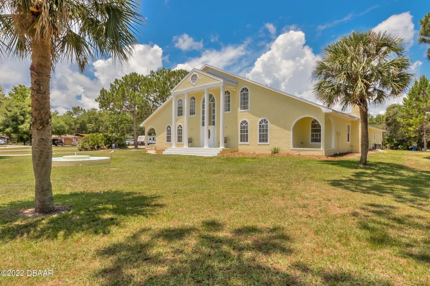 Magnificently HUGE 6/6 POOL Home on 2.5 ACRES in conveniently - Beach Home for sale in Ormond Beach, Florida on Beachhouse.com