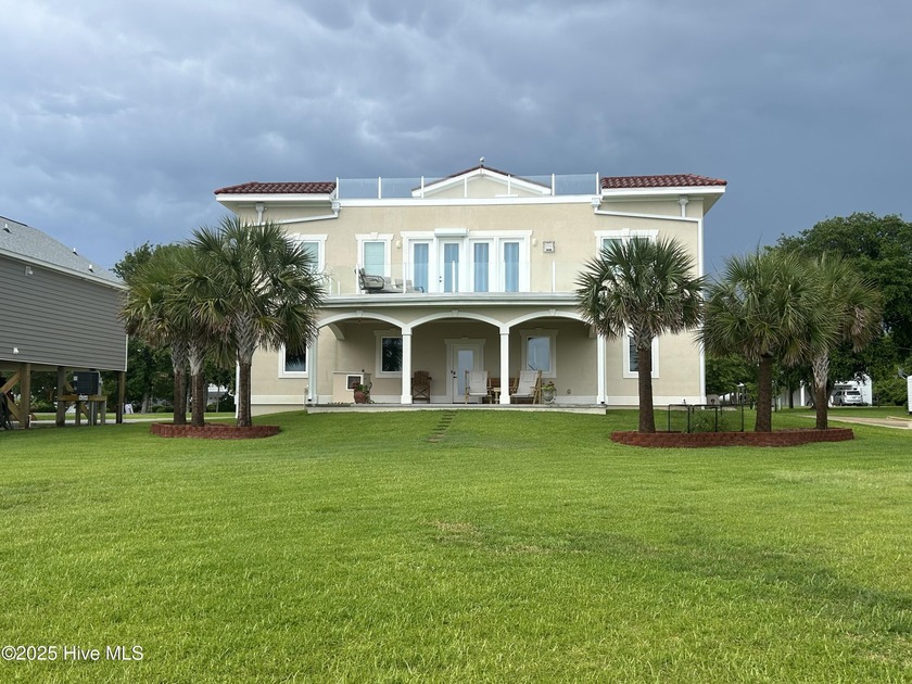 Experience the ultimate waterfront lifestyle in this stunning - Beach Home for sale in Hampstead, North Carolina on Beachhouse.com