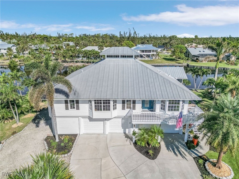 HIGH AND DRY, THIS HOME HAD NO FLOODING FROM RECENT STORMS - Beach Home for sale in Bokeelia, Florida on Beachhouse.com