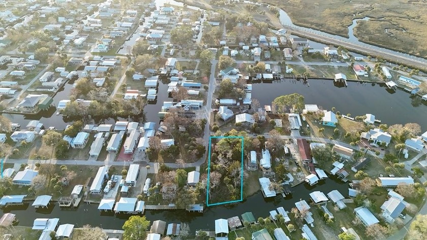 Discover the potential of this oversized 0.5-acre corner lot - Beach Lot for sale in Suwannee, Florida on Beachhouse.com