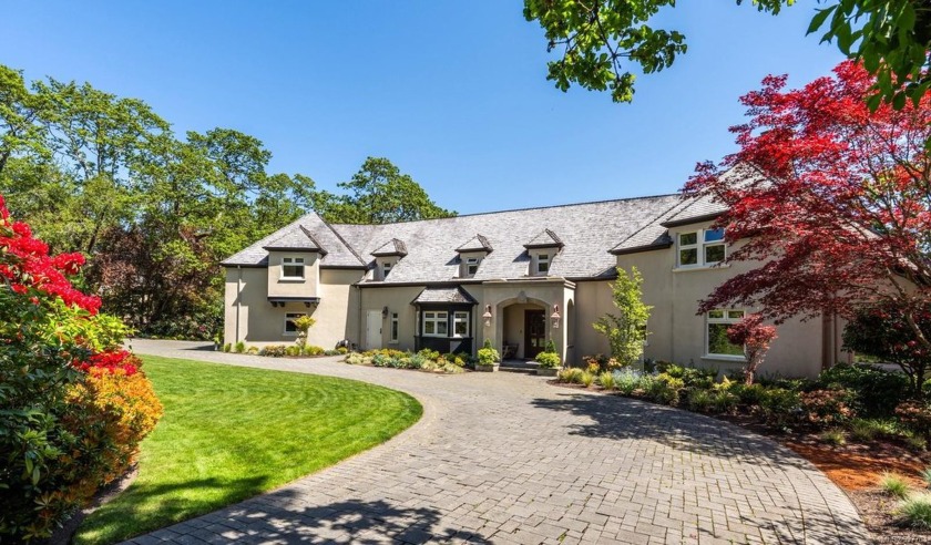 Originally built in 1929, this beautifully updated home sits on - Beach Home for sale in Oak Bay,  on Beachhouse.com