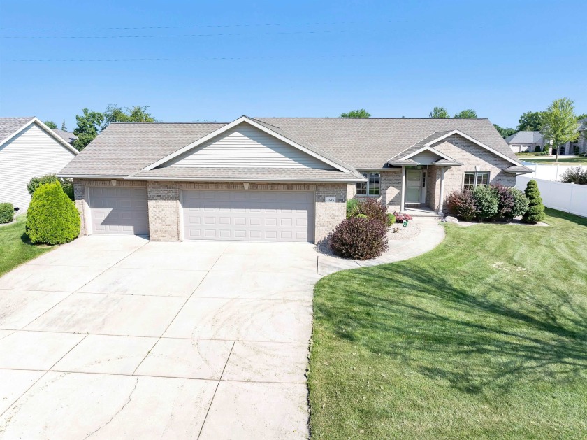 Welcome to this sprawling 2560 sqft showcase home by Johnny B - Beach Home for sale in Green Bay, Wisconsin on Beachhouse.com