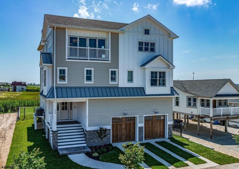 This single-family custom built home offers a level of island - Beach Home for sale in Strathmere, New Jersey on Beachhouse.com