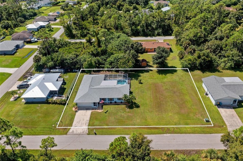 DOUBLE LOT! APPROX.  1/2  ACRE WITH PLENTY OF ROOM TO PARK RV OR - Beach Home for sale in Punta Gorda, Florida on Beachhouse.com