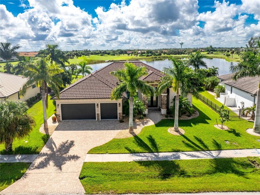 This elegant open concept custom home with superb quality and - Beach Home for sale in Punta Gorda, Florida on Beachhouse.com