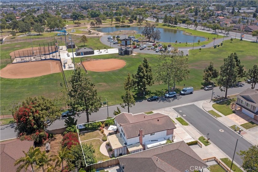 Opportunity meets location in this split-level 4-bedroom, 2 - Beach Home for sale in Santa Ana, California on Beachhouse.com