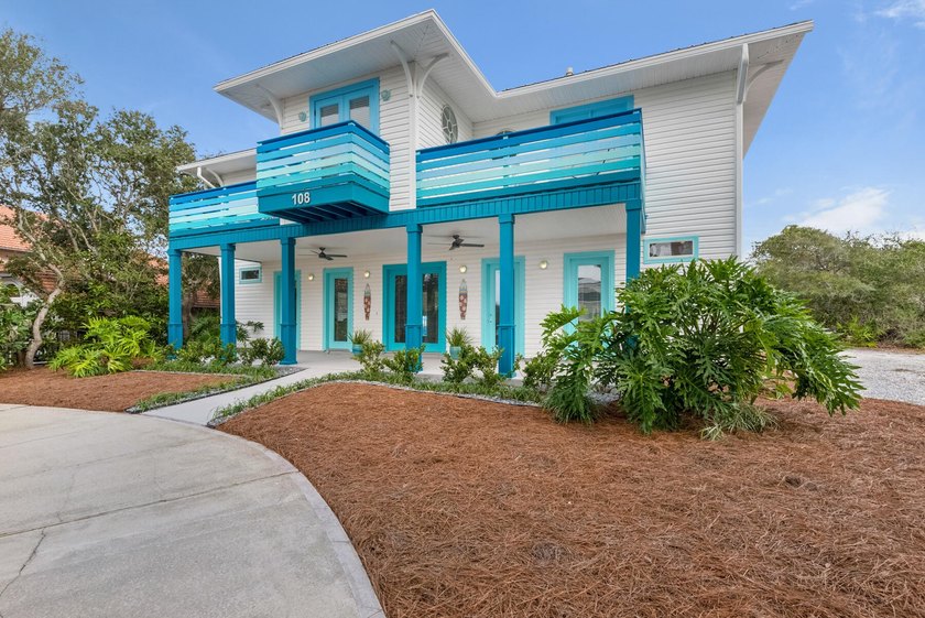 This is a two story house located in the beautiful gated - Beach Home for sale in Inlet Beach, Florida on Beachhouse.com