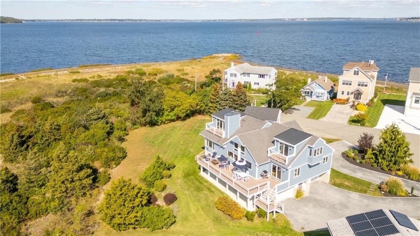 This extraordinary waterfront residence captures the essence of - Beach Home for sale in Portsmouth, Rhode Island on Beachhouse.com
