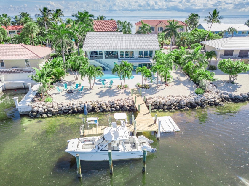 This beautiful oceanfront residence is located on Ocean East, a - Beach Home for sale in Marathon, Florida on Beachhouse.com