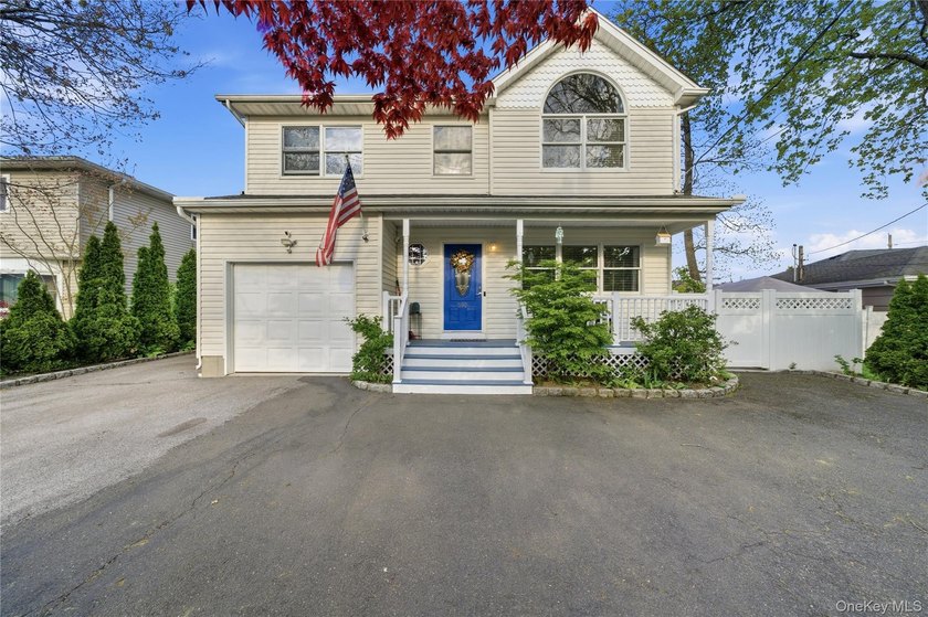 Welcome to this stunning 4 bedroom, 2.5 bathroom Colonial - Beach Home for sale in West Islip, New York on Beachhouse.com