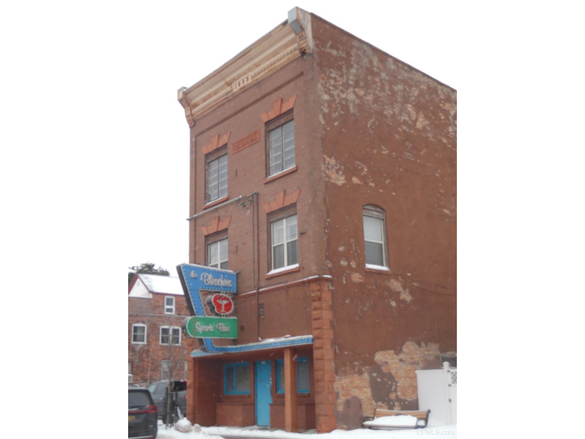 This unique mixed-use commercial building offers a rare - Beach Commercial for sale in Hancock, Michigan on Beachhouse.com