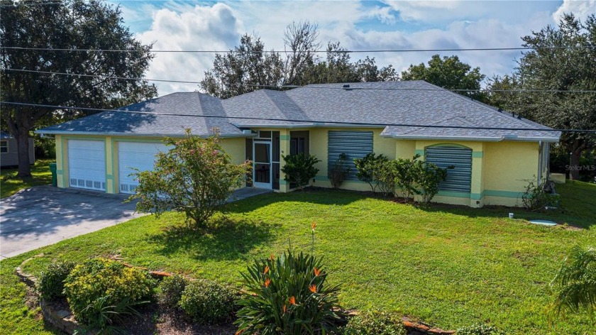 NO BRIDGES OUT!!! This WATERFRONT GEM with 4 GENEROUS LOTS PLUS - Beach Home for sale in Punta Gorda, Florida on Beachhouse.com