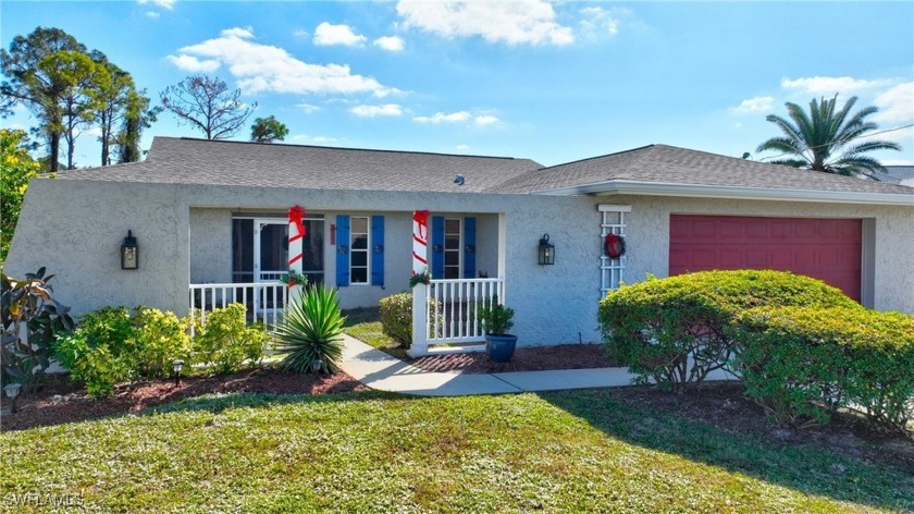 This spacious 3 bedroom, 2 bath POOL HOME with a den and an - Beach Home for sale in Lehigh Acres, Florida on Beachhouse.com