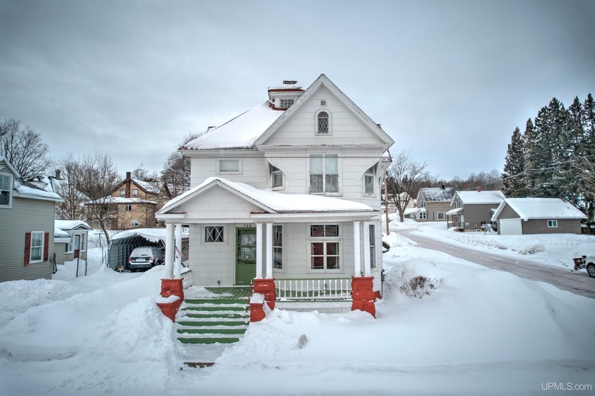 Step back into history with this beautiful Victorian home, held - Beach Home for sale in Lake Linden, Michigan on Beachhouse.com