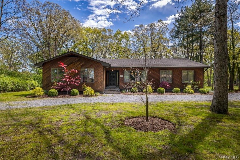 Your out-east living is here! This homey ranch is situated on - Beach Home for sale in Miller Place, New York on Beachhouse.com