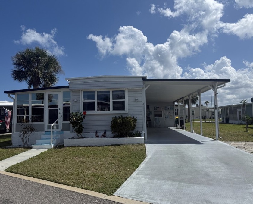 * This home is located in a 55+ resort-style leased land - Beach Home for sale in Melbourne Beach, Florida on Beachhouse.com