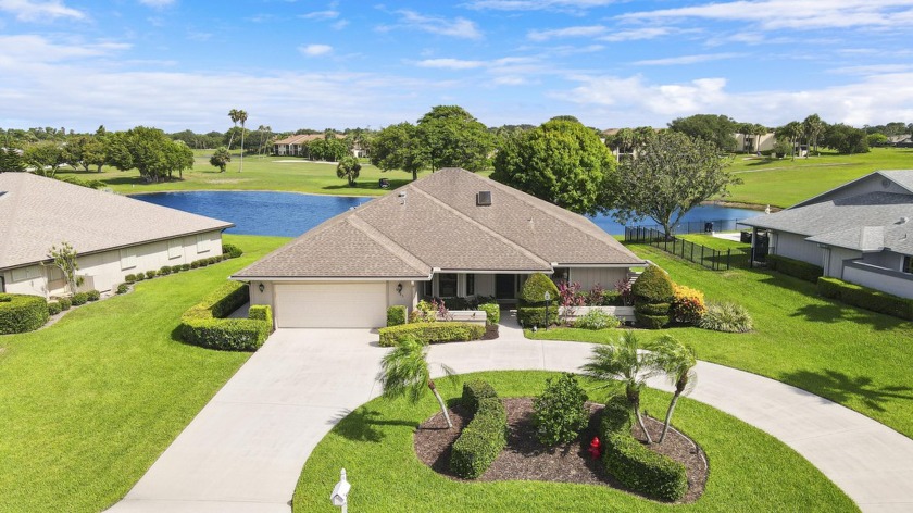 Enjoy panoramic lake and golf course views from this well - Beach Home for sale in Hobe Sound, Florida on Beachhouse.com