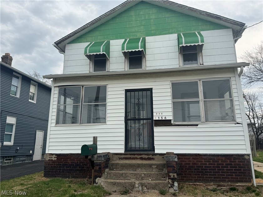 Discover the potential at 433 E 156th. This home offers a - Beach Home for sale in Cleveland, Ohio on Beachhouse.com