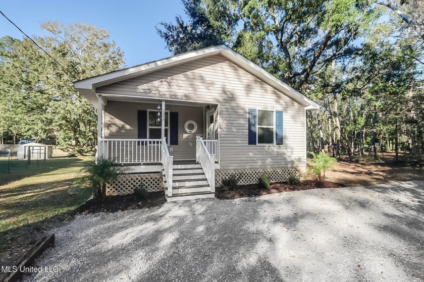 Beautifully renovated from top to bottom! Everything has been - Beach Home for sale in Ocean Springs, Mississippi on Beachhouse.com