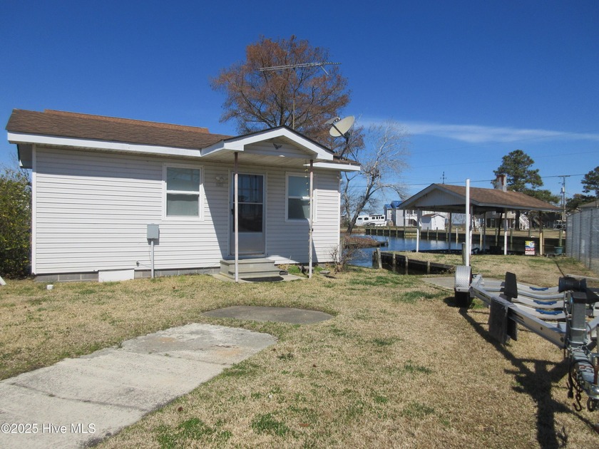 DON'T MISS THESE '' 2 '' larger CANAL FRONT LOTS w/Sewer & Water - Beach Home for sale in Grandy, North Carolina on Beachhouse.com