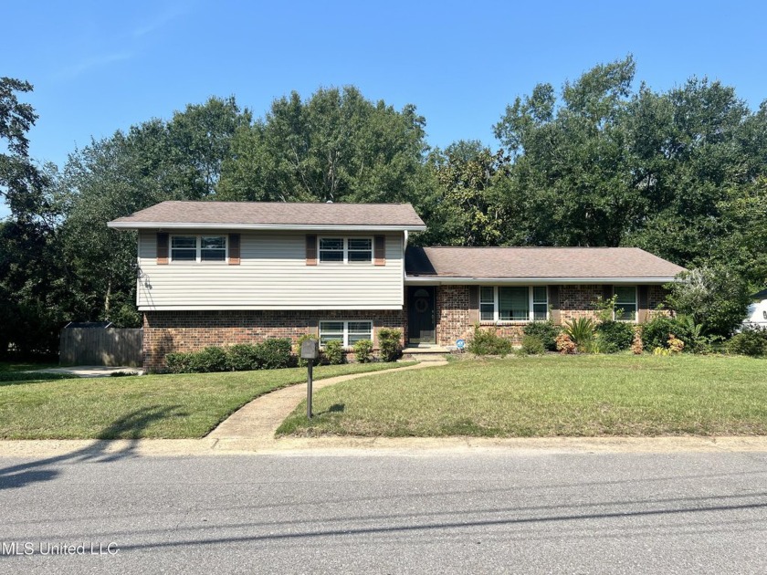 **Stunning Multilevel Home with Water Access & Golf Course - Beach Home for sale in Biloxi, Mississippi on Beachhouse.com