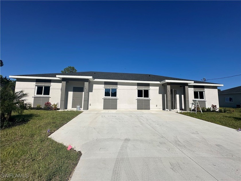 Don't miss this opportunity to own this beautiful duplex with - Beach Home for sale in Lehigh Acres, Florida on Beachhouse.com