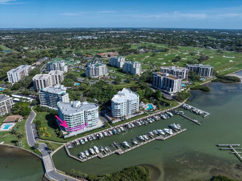 Discretely located behind the guarded gates of the prestigious - Beach Condo for sale in Belleair Beach, Florida on Beachhouse.com