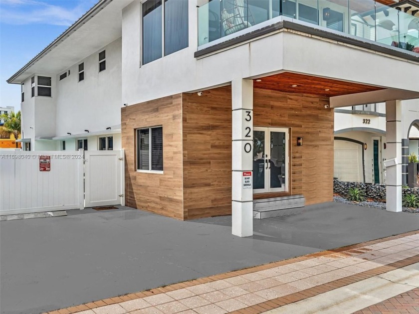 This stunning, fully furnished two-story home is the only - Beach Home for sale in Hollywood, Florida on Beachhouse.com