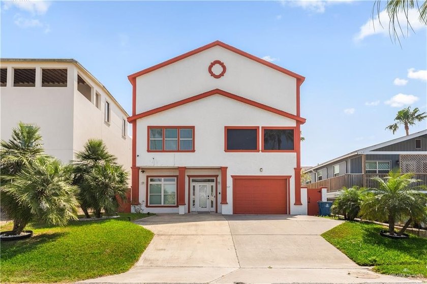 Escape to this meticulously maintained three-story beach house - Beach Home for sale in South Padre Island, Texas on Beachhouse.com