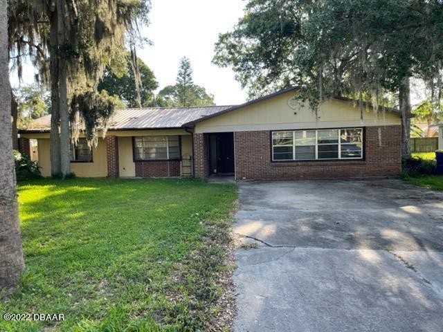 Priced to sell; 4/2 solid home with pool and backyard brick - Beach Home for sale in Edgewater, Florida on Beachhouse.com