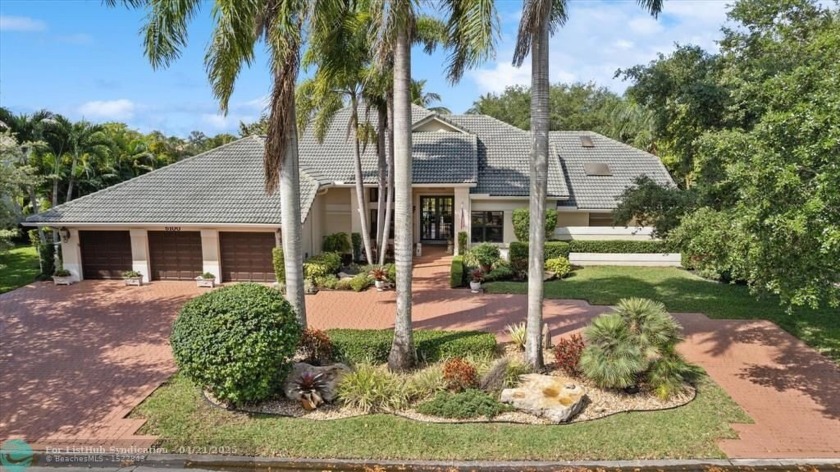 Stunning fully updated 5-bedroom, 4-bath estate home offering - Beach Home for sale in Coral Springs, Florida on Beachhouse.com