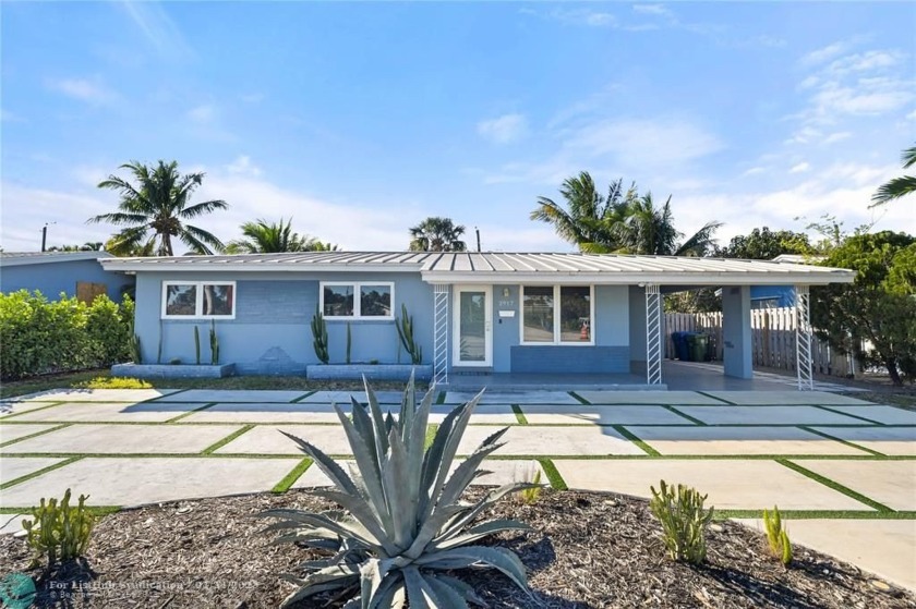 A turnkey residence crafted for effortless Florida living, this - Beach Home for sale in Wilton Manors, Florida on Beachhouse.com