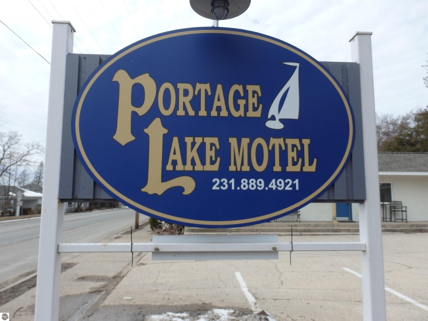 The famous Portage Lake Motel is available for purchase, located - Beach Commercial for sale in Onekama, Michigan on Beachhouse.com
