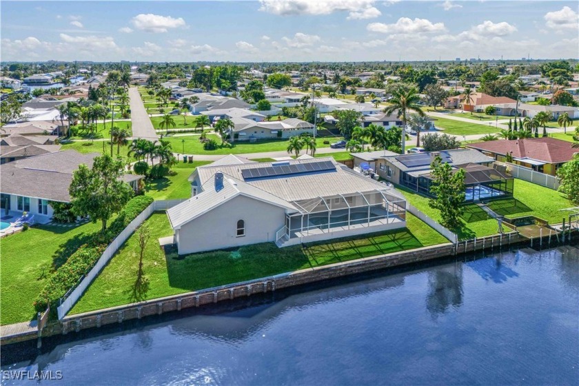 Stunning 4-bedroom + den, 4.5-bath Gulf access home with TWO - Beach Home for sale in Cape Coral, Florida on Beachhouse.com