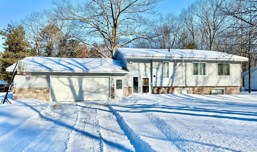 Great Gladstone Location! Situated just down the road from - Beach Home for sale in Gladstone, Michigan on Beachhouse.com