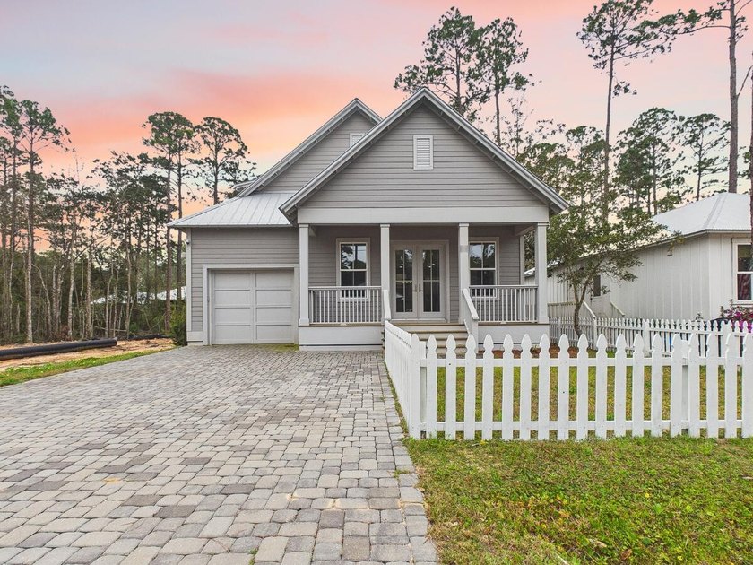 Discover coastal charm and modern luxury in this stunning Point - Beach Home for sale in Santa Rosa Beach, Florida on Beachhouse.com