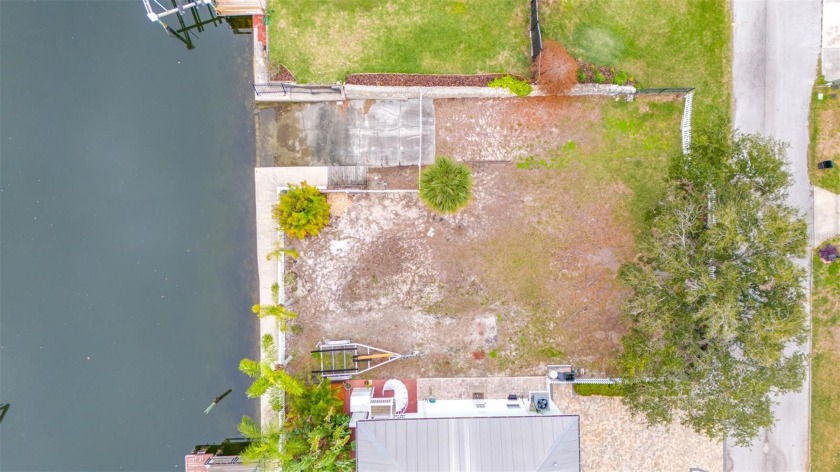 Enjoy BEAUTIFUL SUNSETS from this READY TO BUILD WATERFRONT LOT - Beach Lot for sale in Hudson, Florida on Beachhouse.com