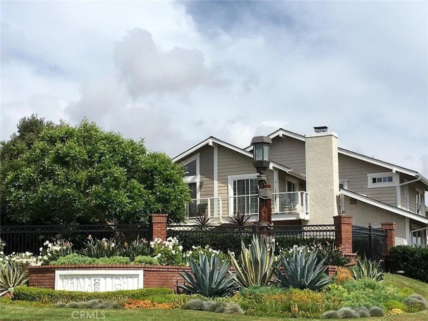 Tucked within the gated coastal enclave of Dana Light, this - Beach Condo for sale in Dana Point, California on Beachhouse.com