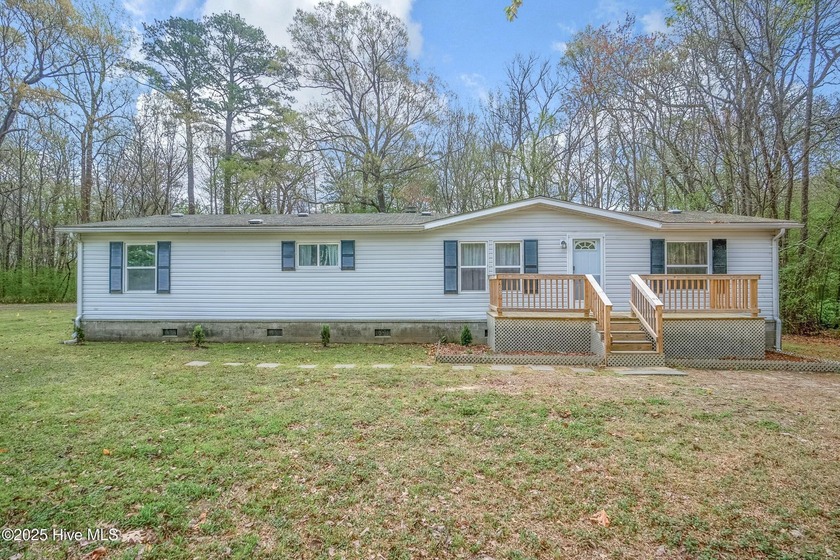 Welcome to 129 Anglers Cove Rd, a beautifully refreshed 3 Bed 2 - Beach Home for sale in Hertford, North Carolina on Beachhouse.com