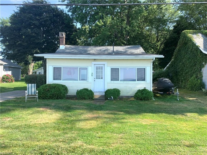 Welcome to this cute lake front bungalow located on the shores - Beach Home for sale in Conneaut, Ohio on Beachhouse.com