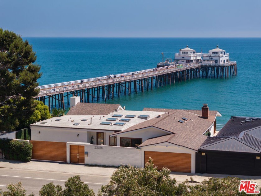 Introducing a rare double-lot beachfront sanctuary with 74 of - Beach Home for sale in Malibu, California on Beachhouse.com
