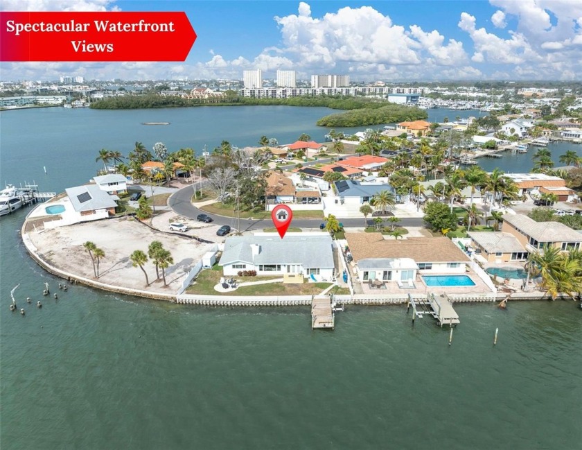 Welcome to your waterfront paradise on Boca Ciega Bay! This - Beach Home for sale in St. Petersburg, Florida on Beachhouse.com